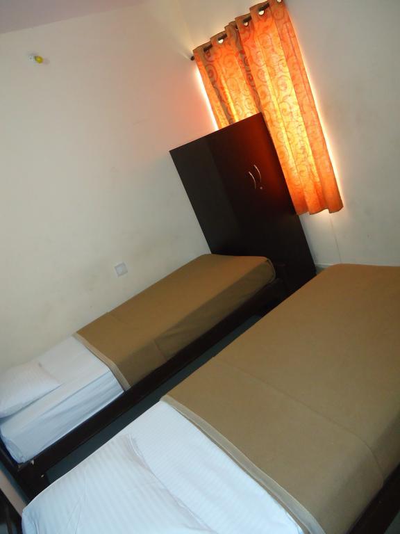 Sri Sai Comforts Hotel Bengaluru Szoba fotó